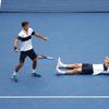 Herbert and Mahut of France celebrate after defeating Murray of Britain and Peers of Australia in the men's doubles final match at the U.S. Open Championships tennis tournament in New York