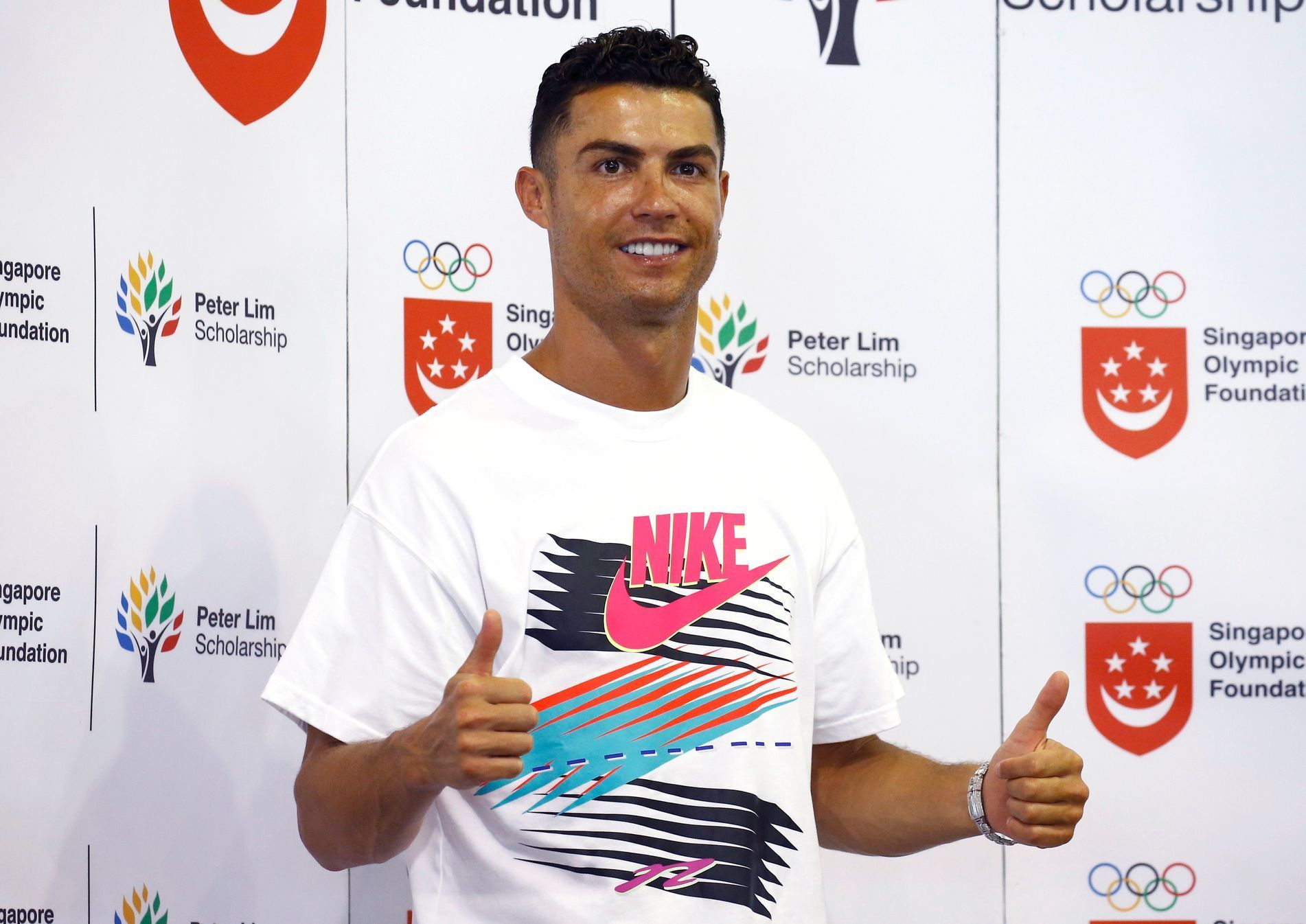 Portuguese soccer player Cristiano Ronaldo is seen during a visit to Yumin Primary School in Singapore
