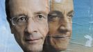 Official campaign posters for Sarkozy and Hollande for the French presidential election are displayed on a wall in Paris