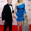 Director Roman Polanski arrives with his wife Emmanuelle Seigner for the 39th Cesar Awards ceremony in Paris