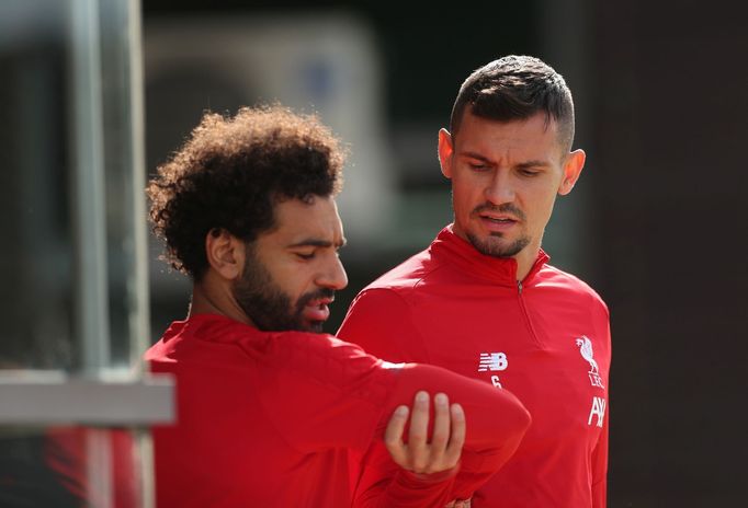 Soccer Football - Champions League - Liverpool Training - Melwood, Liverpool, Britain - September 16, 2019   Liverpool's Mohamed Salah and Dejan Lovren during training