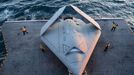 US Navy Launches Drone May 14, 2013 - Virginia Coast, Virginia , U.S. - Sailors move an X-47B onto an aircraft elevator aboard the aircraft carrier USS George H.W. Bush. George H.W. Bush is the first aircraft carrier to successfully catapult launch an unmanned aircraft from its flight deck.