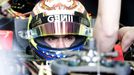 Lotus Formula One driver Pastor Maldonado of Venezuela sits in his car in the team garage during the third practice session of the Australian F1 Grand Prix at the Albert