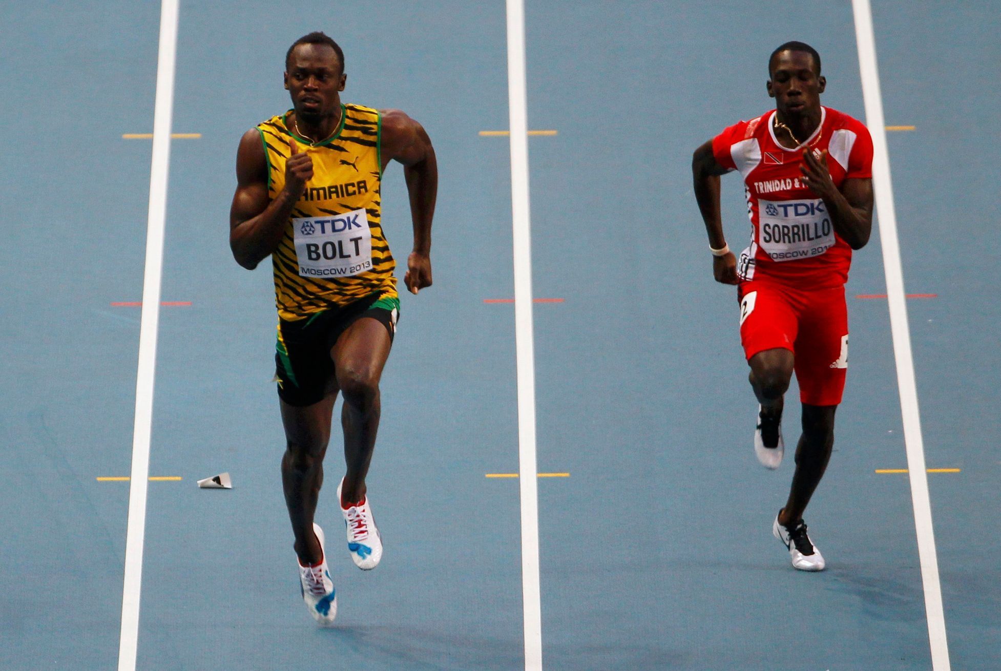 MS v atletice 2013, 100 m - rozběh: Usain Bolt a Rondel Sorrillo