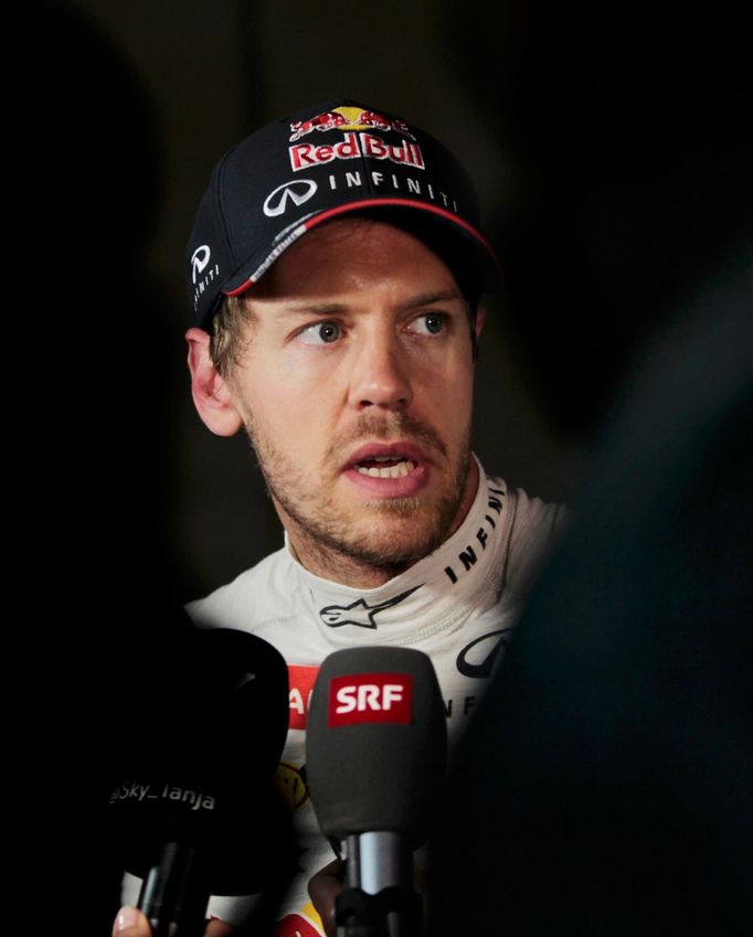 Red Bull Formula One driver Sebastian Vettel of Germany speaks during a news conference after the qualifying session of the Bahrain F1 Grand Prix at the Bahrain Internati