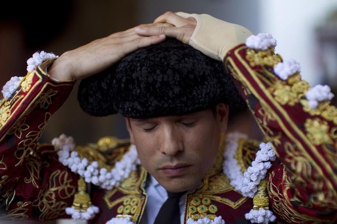 Spanish matador Jose Maria Manzanares adjusts his montera before the start of a bullfight in Seville