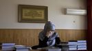 A student attends a lesson in Sharia law at the Russian Islamic University in the Chechen capital Grozny April 23, 2013. The naming of two Chechens, Dzhokhar and Tamerlan Tsarnaev, as suspects in the Boston Marathon bombings has put Chechnya - the former site of a bloody separatist insurgency - back on the world's front pages. Chechnya appears almost miraculously reborn. The streets have been rebuilt. Walls riddled with bullet holes are long gone. New high rise buildings soar into the sky. Spotless playgrounds are packed with children. A giant marble mosque glimmers in the night. Yet, scratch the surface and the miracle is less impressive than it seems. Behind closed doors, people speak of a warped and oppressive place, run by a Kremlin-imposed leader through fear. Picture taken April 23, 2013. REUTERS/Maxim Shemetov (RUSSIA - Tags: SOCIETY POLITICS RELIGION EDUCATION) ATTENTION EDITORS: PICTURE 29 OF 40 FOR PACKAGE 'INSIDE MODERN CHECHNYA'. SEARCH 'REBUILDING CHECHNYA' FOR ALL IMAGES Published: Kvě. 1, 2013, 8:19 dop.