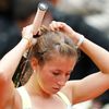 Beck of Germany adjusts her hair during her women's singles
