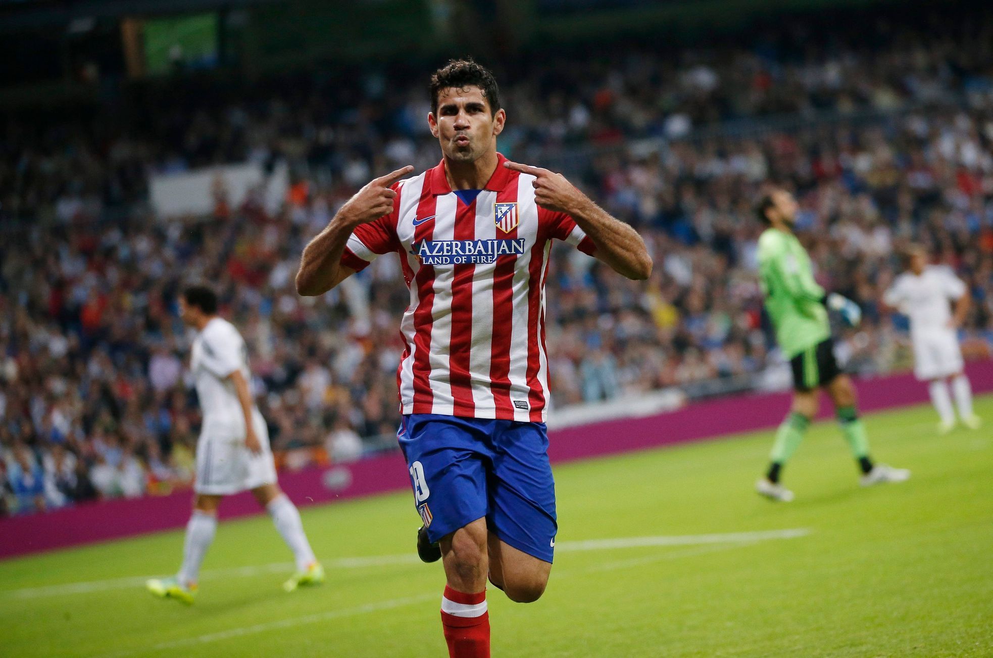 Diego Costa slaví gól do sítě Realu Madrid