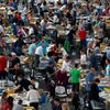 Electoral officials sort ballot papers after conclusion of voting in European Parliament elections in Munich