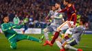 AS Roma's Edin Dzeko (2R) in action with Real Madrid