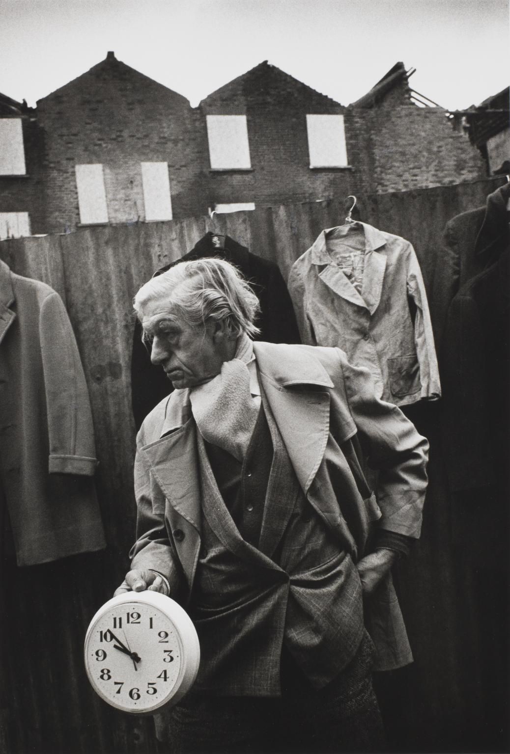 Markéta Luskačová: Edward with clock, Off Cheshire Street Market, London, 1983