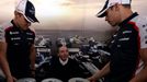 Williams Formula One team founder Frank Williams (C) poses with drivers Valtteri Bottas (L) and Pastor Maldonado during a party marking the team's 600th race, ahead of th