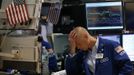 Trader Mario Picone works on the floor of the New York Stock Exchange in this June 1, 2012 file photo. While growth has been slowing in China and the United States and companies warn about the effect on earnings, there is a mounting sense among the financial community that politicians and markets are operating on two completely different timelines. REUTERS/Brendan McDermid/Files. (UNITED STATES - Tags: BUSINESS) Published: Čer. 25, 2012, 6:57 odp.