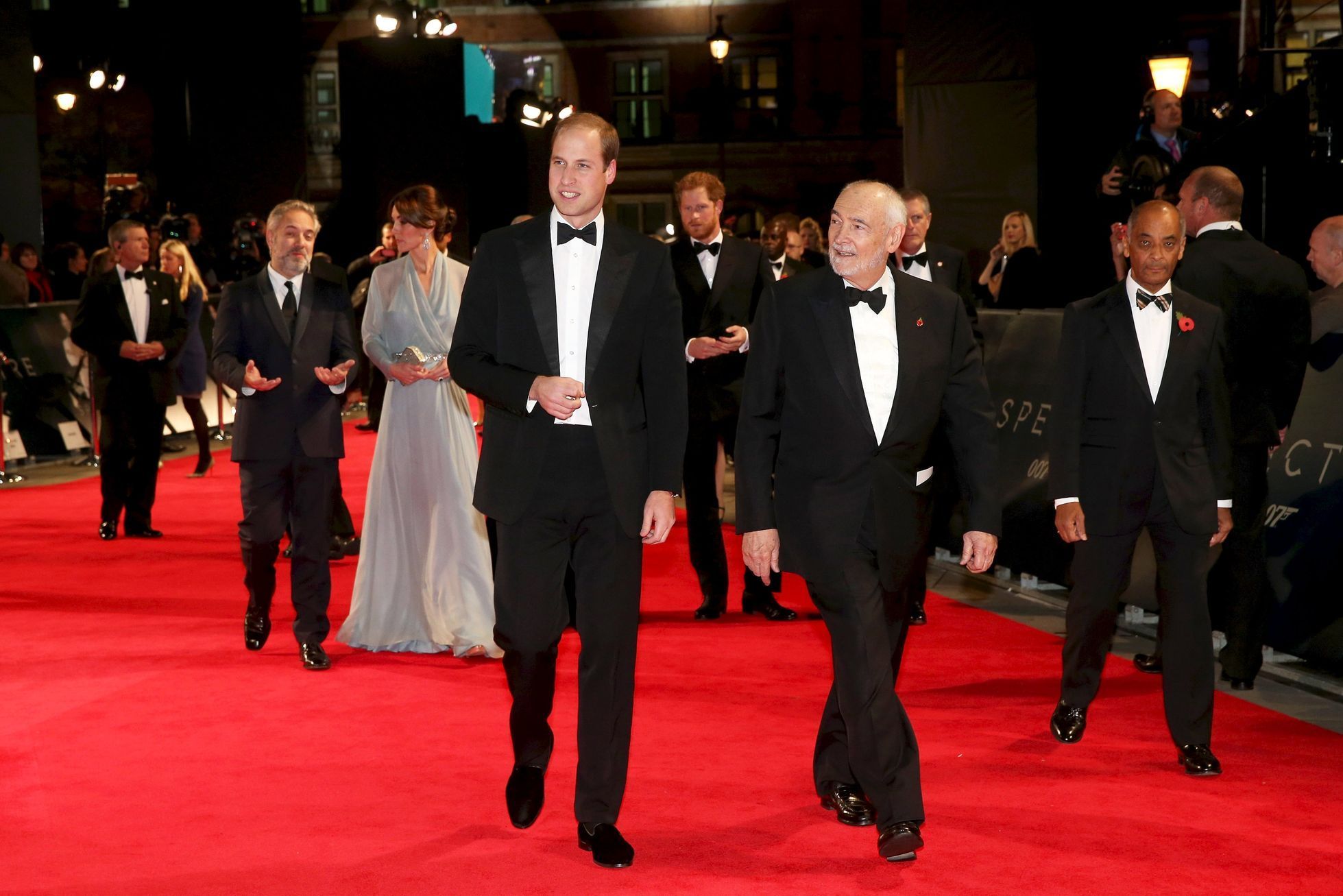 Sam Mendes, Duchess of Cambridge, Duke of Cambridge, Prince Harry and producer Michael G. Wilson attend The Cinema and Television Benevolent Fund's Royal Film Performance 2015 of the new Jame
