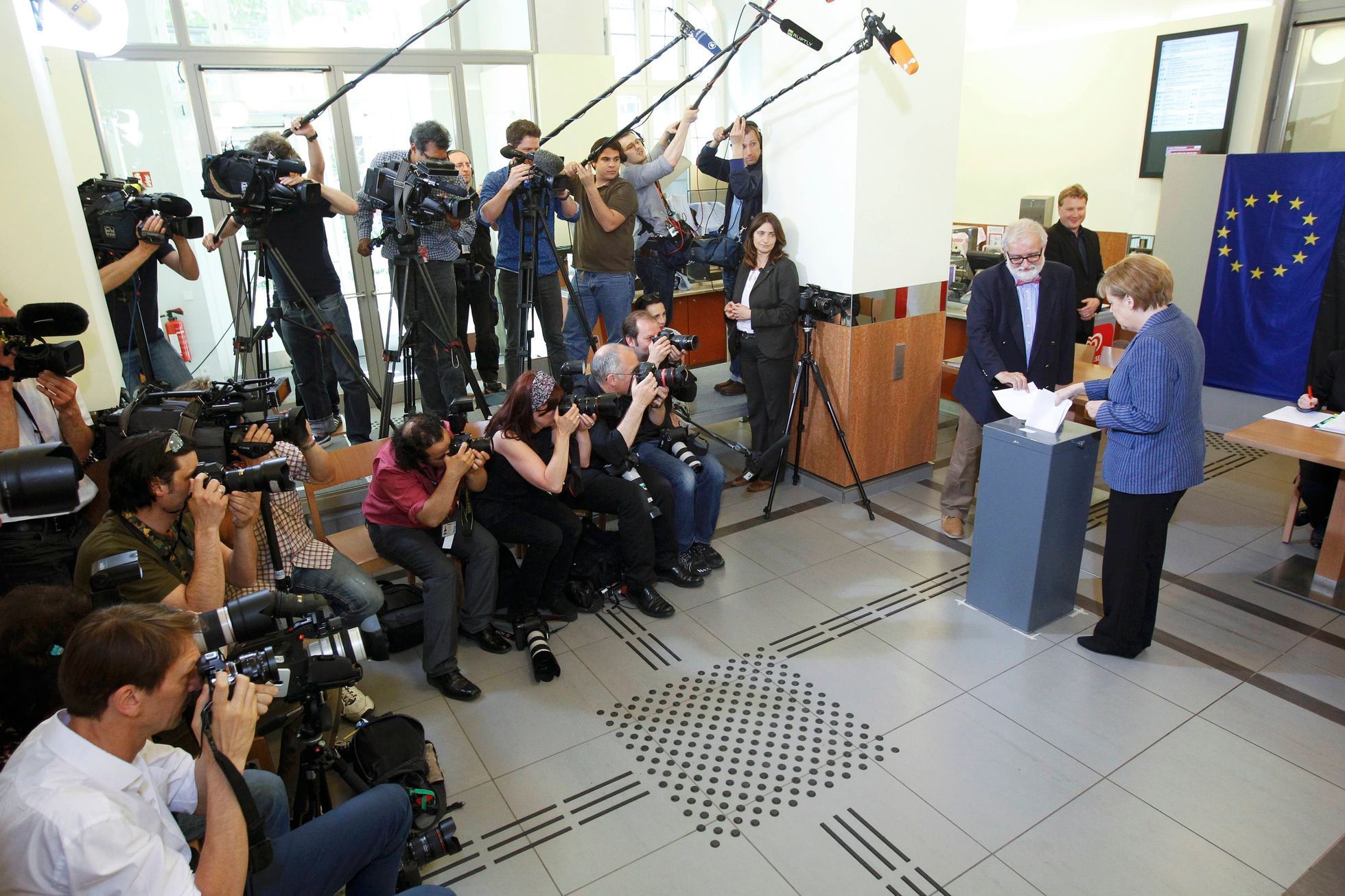 German Chancellor Merkel cast her ballot in the European Parliament election at a polling station in Berlin
