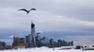 The skyline of New York's Lower Manhattan and One World Trade Center after the passing of a winter storm in Newport in New Jersey, February 9, 2013. A blizzard packing hurricane-force winds pummelled the northeastern United States on Saturday, killing at least one person, leaving about 600,000 customers without power and disrupting thousands of flights. REUTERS/Eduardo Munoz (UNITED STATES - Tags: ENVIRONMENT DISASTER) Published: Úno. 9, 2013, 3:52 odp.