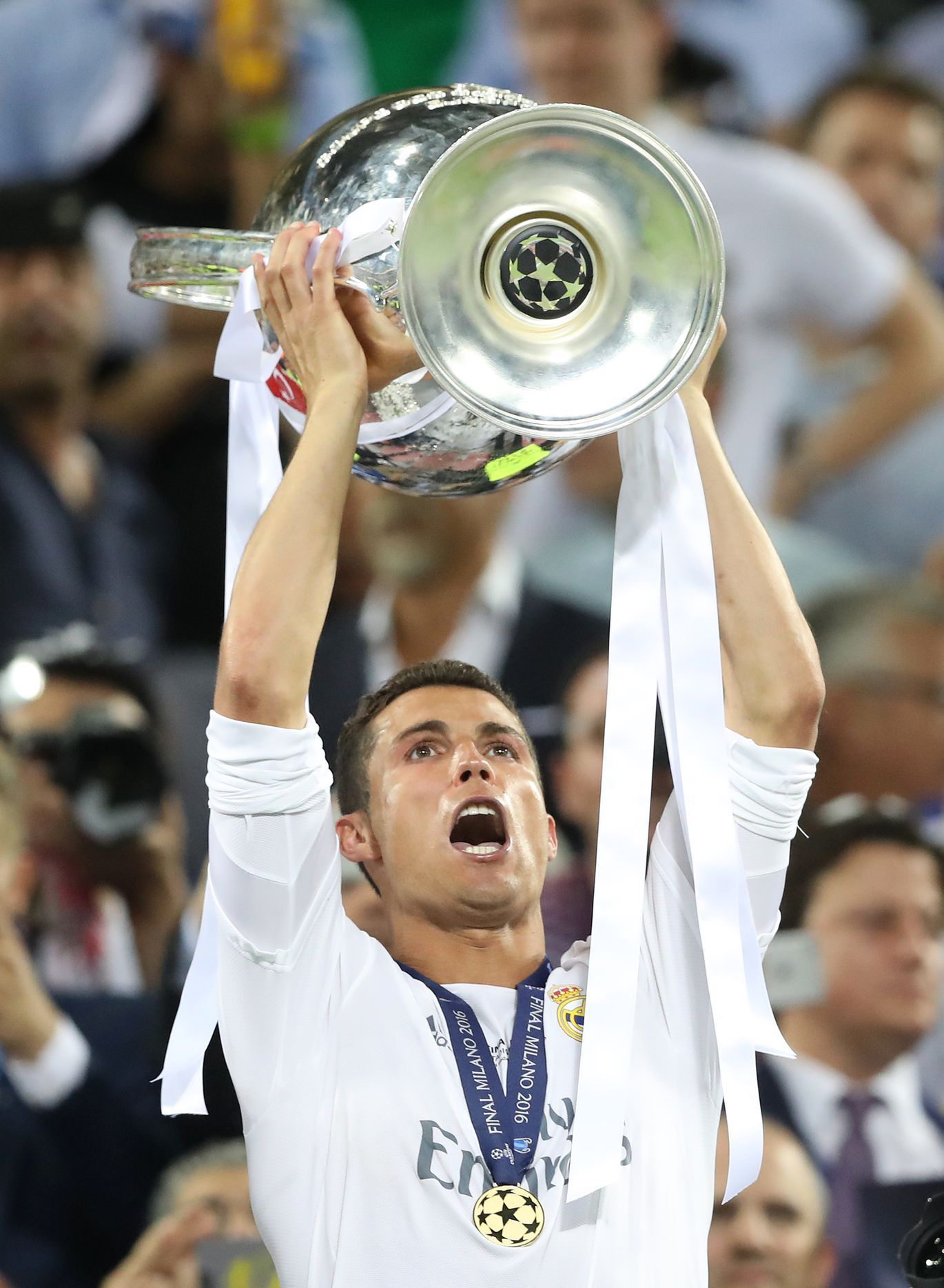 Real Madrid's Cristiano Ronaldo celebrates with the trophy after winning the UEFA Champions League