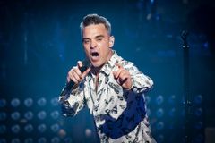Robbie Williams míří do Prahy. Už nejsem kontroverzní, jedu lidi prostě bavit, vzkazuje