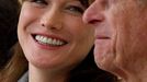 Britain's Prince Philip (R) and France's first lady Carla Bruni smile during a review of the Guard of Honour at Windsor Castle in Windsor, southern England March 26, 2008. French President Nicolas Sarkozy arrived in London on Wednesday on a state visit he hopes will improve cooperation with Britain on illegal immigration, defence and the economy. REUTERS/Lewis Whyld/Pool (BRITAIN)