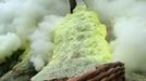 An Indonesian sulphur miner collects sulphur from the crater atop the Ijen volcano in Banyuwangi, on East Java, on December 15, 2009. An active vent at the Ijen volcano 2