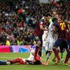 Barcelona's Busquets steps on Real Madrid's Pepe after Lionel Messi's goal against Real Madrid during La Liga's second 'Clasico' soccer match of the season in Madrid