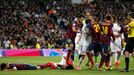 Barcelona's Busquets steps on Real Madrid's Pepe after Lionel Messi's goal against Real Madrid during La Liga's second 'Clasico' soccer match of the season in Madrid