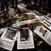 Flowers with pictures of dead workers are seen during protest against the 2014 World Cup, in Sao Paulo