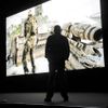 Executive producer of "Medal of Honor Warfighter" Greg Goodrich looks at a demonstration during the Electronic Arts news conference, as part of the E3, in Los Angeles, California, June 4, 2012. REUTERS/Gus Ruelas (UNITED STATES - Tags: ENTERTAINMENT SCIENCE TECHNOLOGY BUSINESS) Published: Čer. 5, 2012, 5:02 dop.