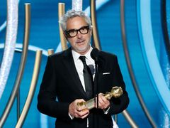 Režisér Alfonso Cuarón se dvěma Zlatými glóby za Romu.