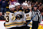 Oct 10, 2019; Denver, CO, USA; Boston Bruins right wing David Pastrňák (88) celebrates his goal with left wing Brad Marchand (63) and center David Krejčí (46) in the firs