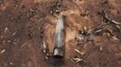 Ordnance used by al Qaeda-linked militants is pictured on the ground in Konna, Mali, January 27, 2013. REUTERS/Joe Penney (MALI - Tags: MILITARY CONFLICT POLITICS) Published: Led. 27, 2013, 4:19 odp.