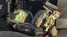 The crash helmet of Britain's Prince Harry and his personnel kit are seen at the side of the cockpit of his Apache helicopter in Camp Bastion, southern Afghanistan in this photograph taken November 1, 2012, and released January 21, 2013. The Prince, who is serving as a pilot/gunner with 662 Squadron Army Air Corps, is on a posting to Afghanistan that runs from September 2012 to January 2013. Photograph taken November 1, 2012. REUTERS/John Stillwell/Pool (AFGHANISTAN - Tags: MILITARY POLITICS SOCIETY ROYALS CONFLICT) Published: Led. 21, 2013, 8 odp.