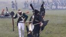 Participants in period costume re-enact the battle of Borodino during anniversary celebrations at the Borodino museum-reserve outside Moscow September 2, 2012. Russian President Vladimir Putin made a rousing call for unity among Russia's diverse ethnic and religious groups on Sunday as he led commemorations of a battle 200 years ago that led to the defeat of Napoleon Bonaparte. REUTERS/Sergei Karpukhin (RUSSIA - Tags: ANNIVERSARY POLITICS CONFLICT) Published: Zář. 2, 2012, 8:27 odp.