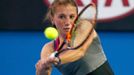 Annika Beck of Germany hits a return to Ana Ivanovic of Serbia during their women's singles match at the Australian Open 2014 tennis tournament in Melbourne January 15, 2