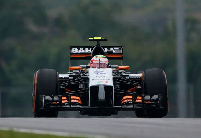 Force India Formula One driver Sergio Perez of Mexico drives during the second practice session of the Malaysian F1 Grand Prix at Sepang International Circuit outside Kua