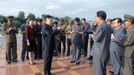 North Korean leader Kim Jong-Un (C) and an unidentified woman (red) visit the Rungna People's Pleasure Ground, which is nearing completion, in this undated picture released by the North's KCNA in Pyongyang on July 25, 2012. REUTERS/KCNA (NORTH KOREA - Tags: POLITICS) THIS IMAGE HAS BEEN SUPPLIED BY A THIRD PARTY. IT IS DISTRIBUTED, EXACTLY AS RECEIVED BY REUTERS, AS A SERVICE TO CLIENTS. NO THIRD PARTY SALES. NOT FOR USE BY REUTERS THIRD PARTY DISTRIBUTORS. QUALITY FROM SOURCE Published: Čec. 25, 2012, 10:41 dop.