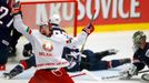 Alexander Kitarov of Belarus celebrates his goal against the U.S. during their Ice Hockey World Championship game at the CEZ arena in Ostrava, Czech Republic May 7, 2015.