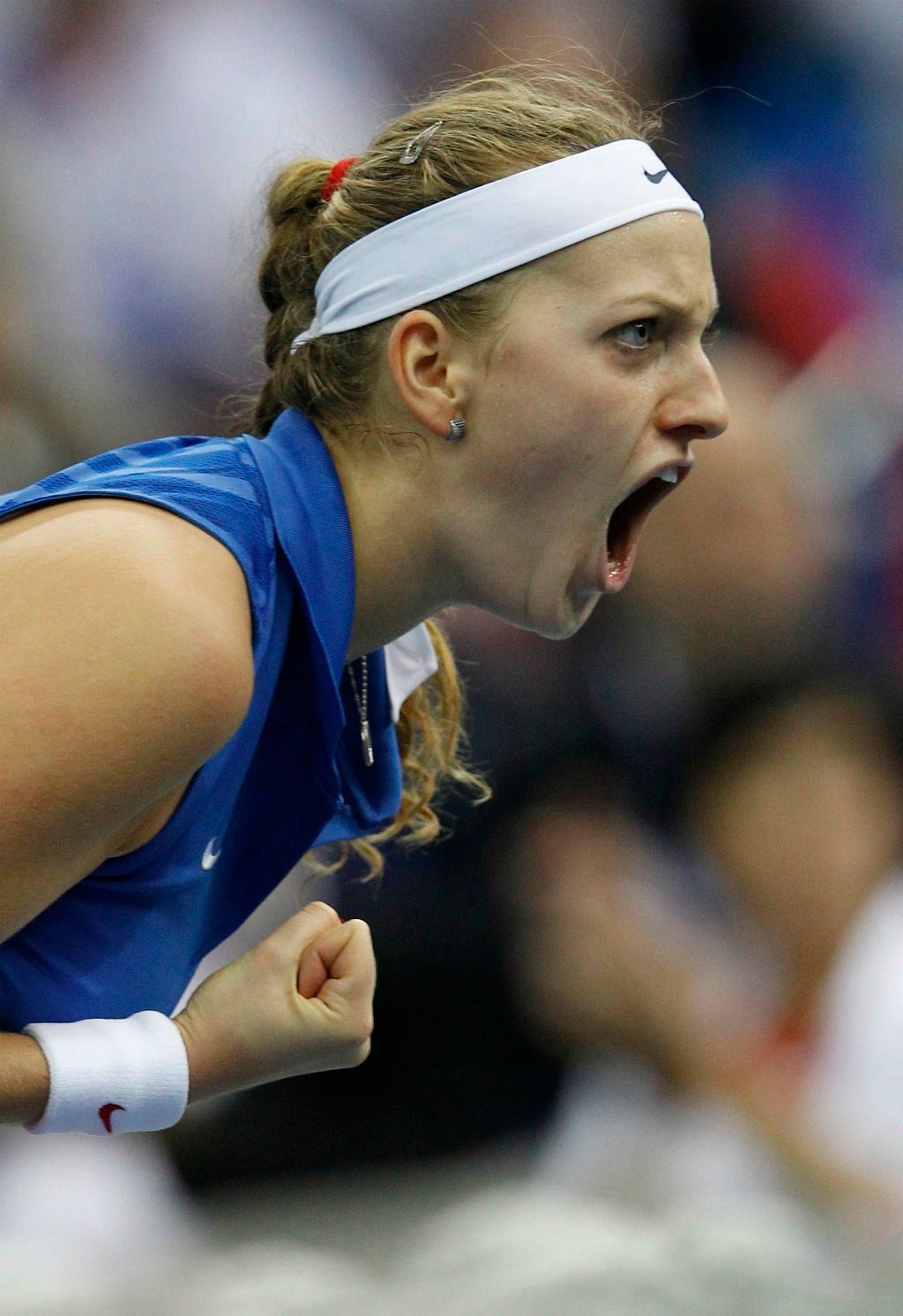 Česká tenistka Petra Kvitová slaví vítězství ve finále Fed Cupu 2011 proti Rusku.