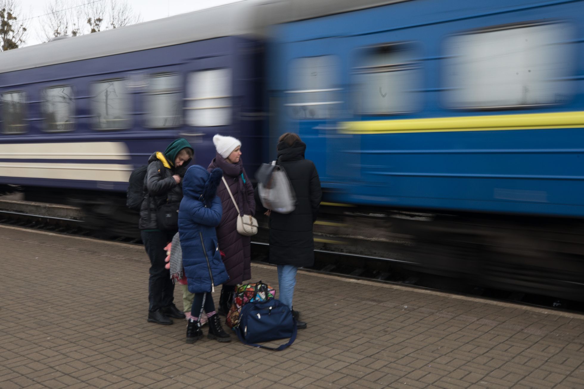 Válka na Ukrajině - nádraží Lvov, uprchlíci, děti, ukrajinci, humanitární krize