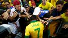 Fans congratulate Brazil's Lucas after winning their Confederations Cup final soccer match against Spain at the Estadio Maracana in Rio de Janeiro June 30, 2013. REUTERS/