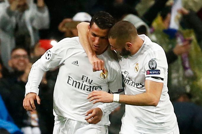 Real Madrid's Cristiano Ronaldo celebrates scoring their second goal with Karim Benzema