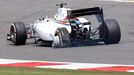 Williams Formula One team driver Felipe Massa drives his damaged car during the British Grand Prix at the Silverstone Race Circuit, central England, July 6, 2014. REUTERS