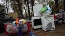 Three-year-old Nayara Valdes holds on to one of her teddy bears after a bulldozer demolished the small school, where she lived with her family, at the Spanish gypsy settlement of Puerta de Hierro, in the outskirts of Madrid November 20, 2012. Fifty-four families have been living in Puerta de Hierro, on the banks of the Manzanares river for over 50 years. Since the summer of 2010, the community has been subject to evictions on the grounds that the dwellings are illegal. Families, whose homes have been demolished, move in with relatives whose houses still remain while the debris keeps piling up around them as more demolitions take place. REUTERS/Susana Vera (SPAIN) Published: Lis. 20, 2012, 5:03 odp.