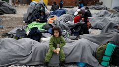 Uprchlíci poté, co překročili řecko-makedonskou hranici.