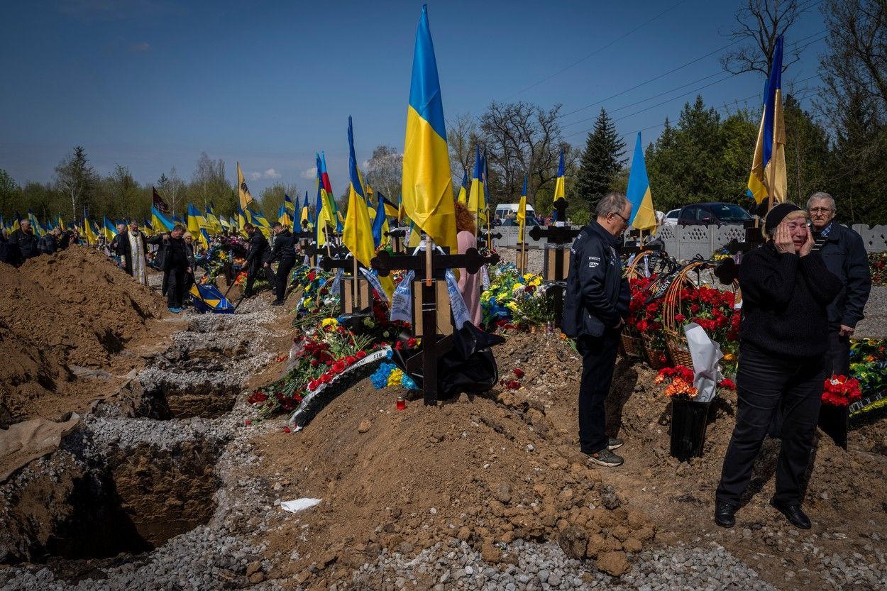 ukrajina válka hrobníci