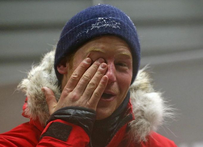 Britain's Prince Harry rubs his eye after a cold chamber training exercise with the Walking with the Wounded South Pole Allied Challenge 2013 British team at Nuneaton in central England