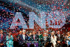 Confetti falls as the leader of ANO party Andrej Babis speaks during a press conference after the preliminary results of the parliamentary election, in Prague, Czech Repu