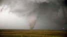 Strong tornado, F-3, rips across farmland just southwest of Hill City, Kansas in early June.