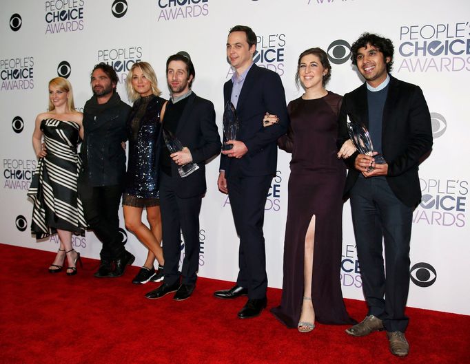 The cast of &quot;The Big Bang Theory&quot; poses backstage with their award during the People's Choice Awards 2016 in Los Angeles